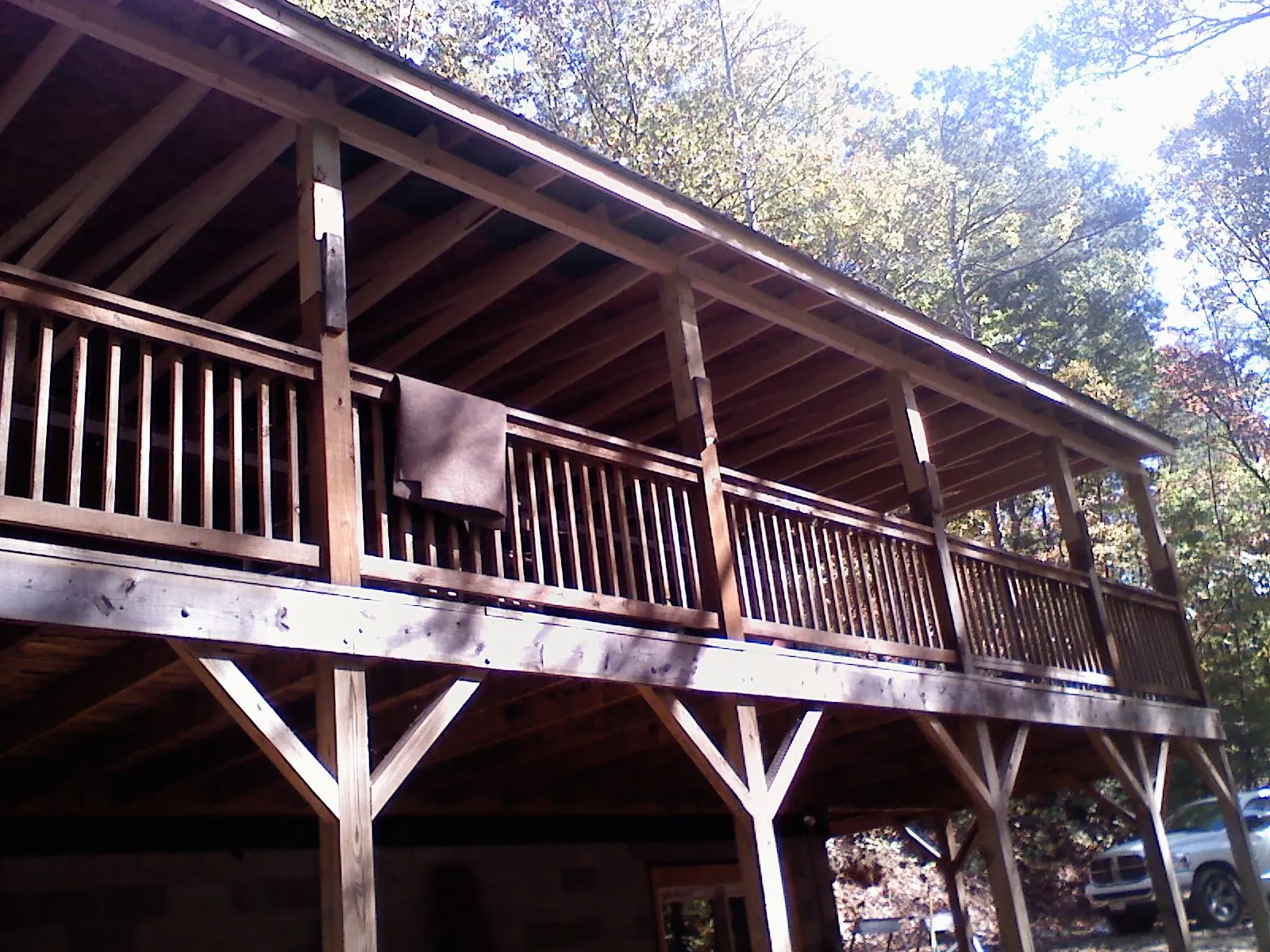 Timber framing under a new elevated porch and deck — Roof Leak Repair in New Meadows by Roofing Brothers